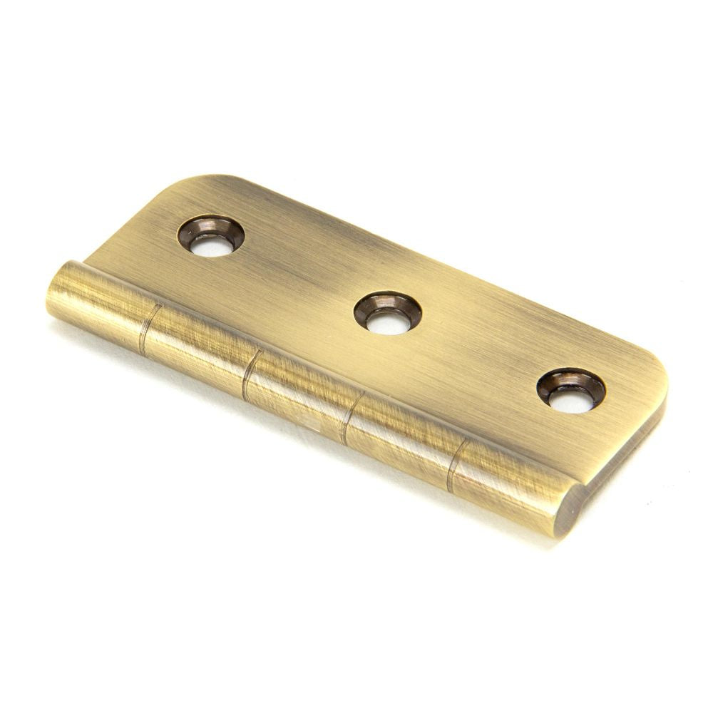 This is an image showing From The Anvil - Aged Brass 3" Dummy Butt Hinge (Single) available from trade door handles, quick delivery and discounted prices