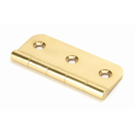 This is an image showing From The Anvil - Polished Brass 3" Dummy Butt Hinge (Single) available from trade door handles, quick delivery and discounted prices