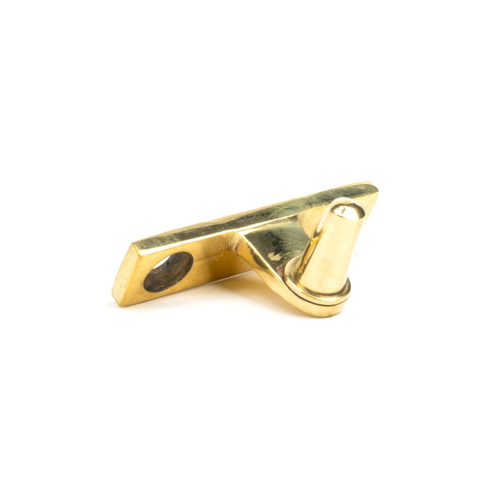 This is an image showing From The Anvil - Aged Brass Cranked Casement Stay Pin available from trade door handles, quick delivery and discounted prices