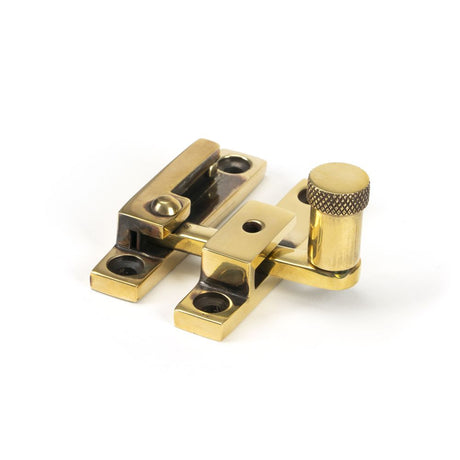 This is an image showing From The Anvil - Aged Brass Brompton Quadrant Fastener - Narrow available from trade door handles, quick delivery and discounted prices