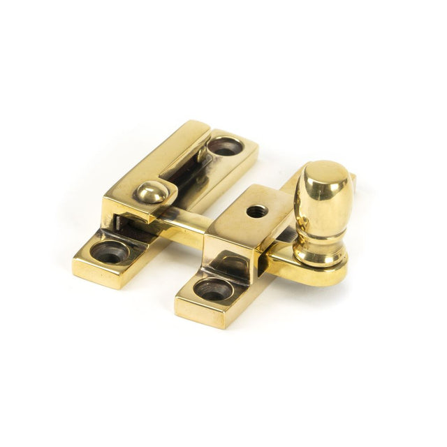 This is an image showing From The Anvil - Aged Brass Mushroom Quadrant Fastener - Narrow available from trade door handles, quick delivery and discounted prices