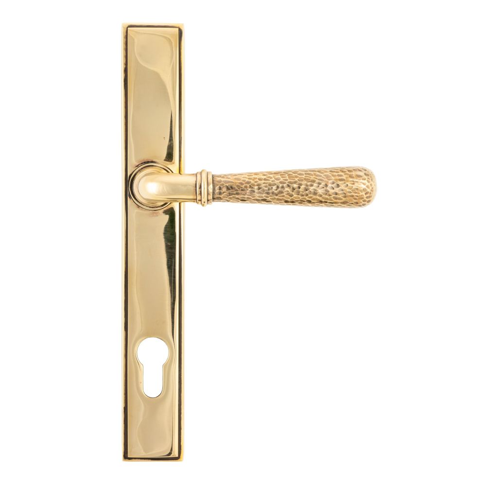 This is an image showing From The Anvil - Aged Brass Hammered Newbury Slimline Espag. Lock Set available from trade door handles, quick delivery and discounted prices