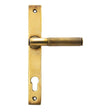 This is an image showing From The Anvil - Aged Brass Brompton Slimline Lever Espag. Lock Set available from trade door handles, quick delivery and discounted prices