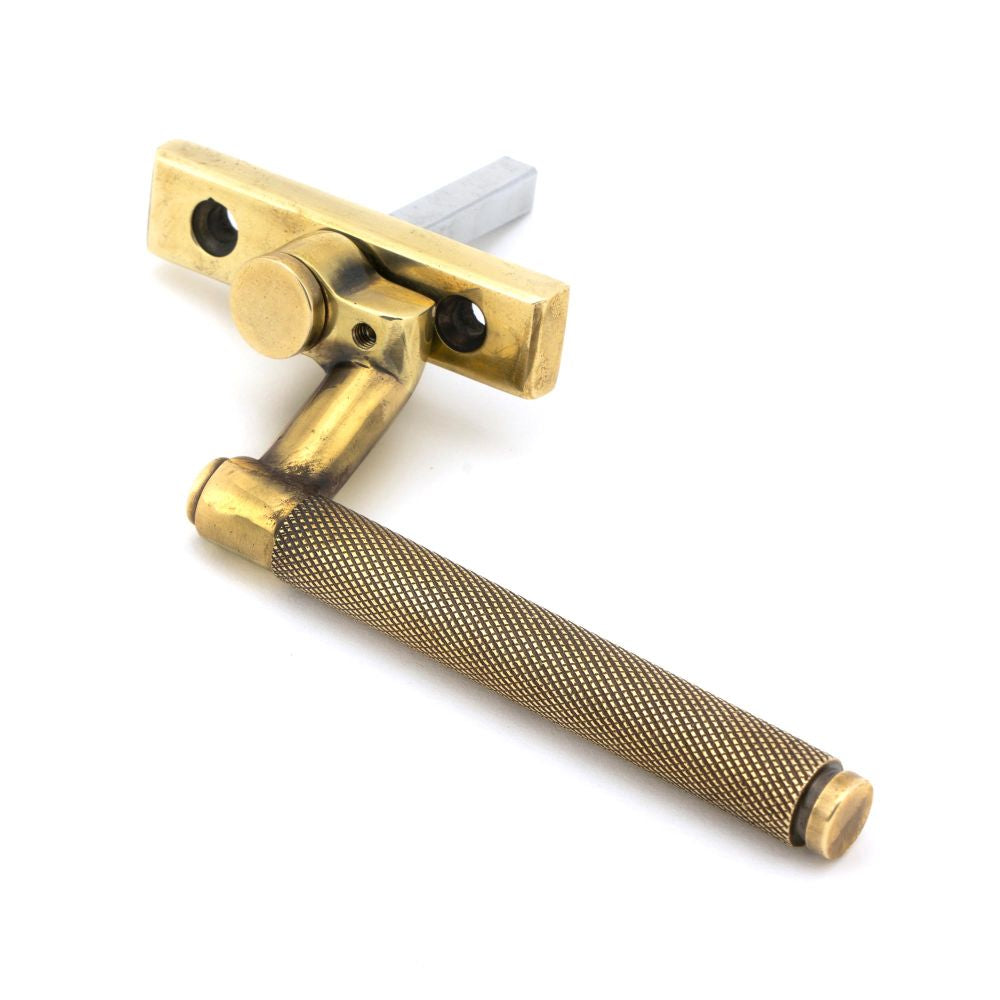 This is an image showing From The Anvil - Aged Brass Brompton Espag - LH available from trade door handles, quick delivery and discounted prices