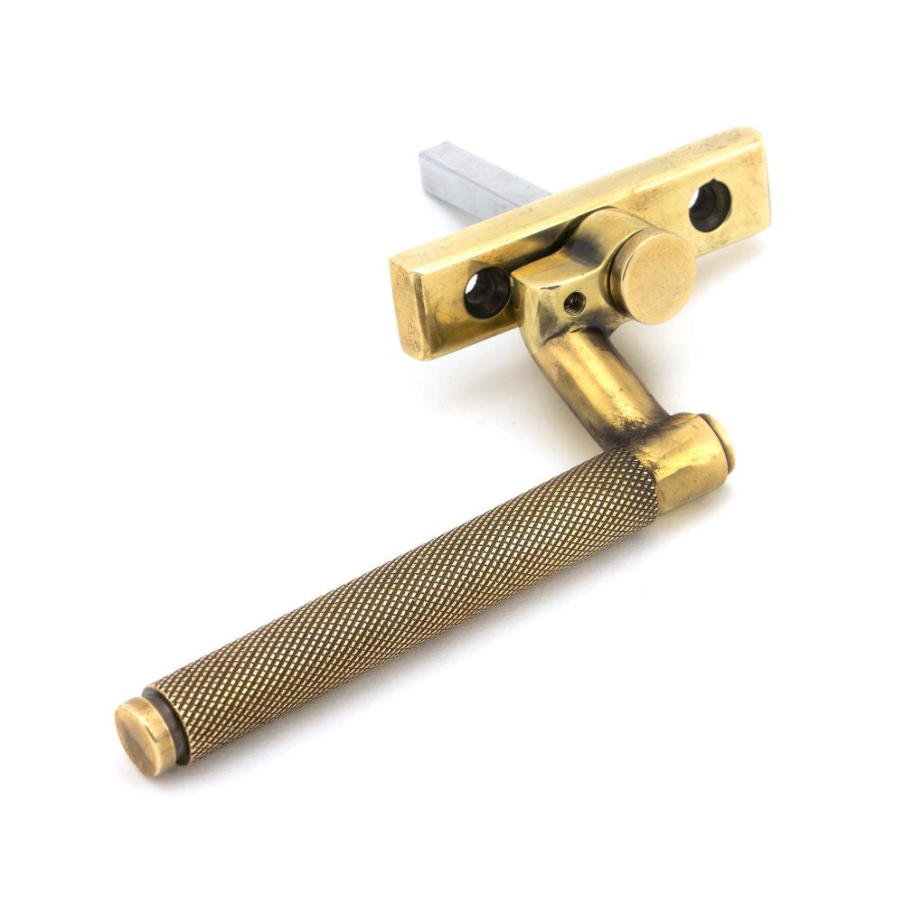 This is an image showing From The Anvil - Aged Brass Brompton Espag - RH available from trade door handles, quick delivery and discounted prices