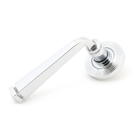 This is an image showing From The Anvil - Polished Chrome Avon Round Lever on Rose Set (Beehive) available from trade door handles, quick delivery and discounted prices