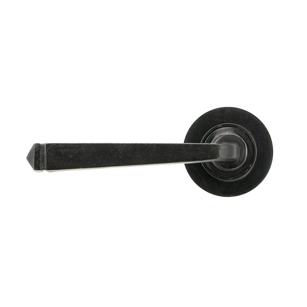 This is an image showing From The Anvil - External Beeswax Avon Round Lever on Rose Set (Plain) available from trade door handles, quick delivery and discounted prices