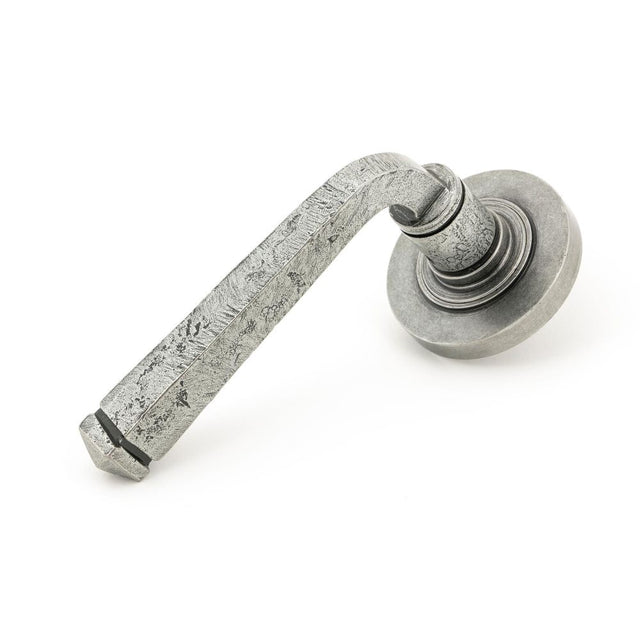 This is an image showing From The Anvil - Pewter Avon Round Lever on Rose Set (Plain) available from trade door handles, quick delivery and discounted prices