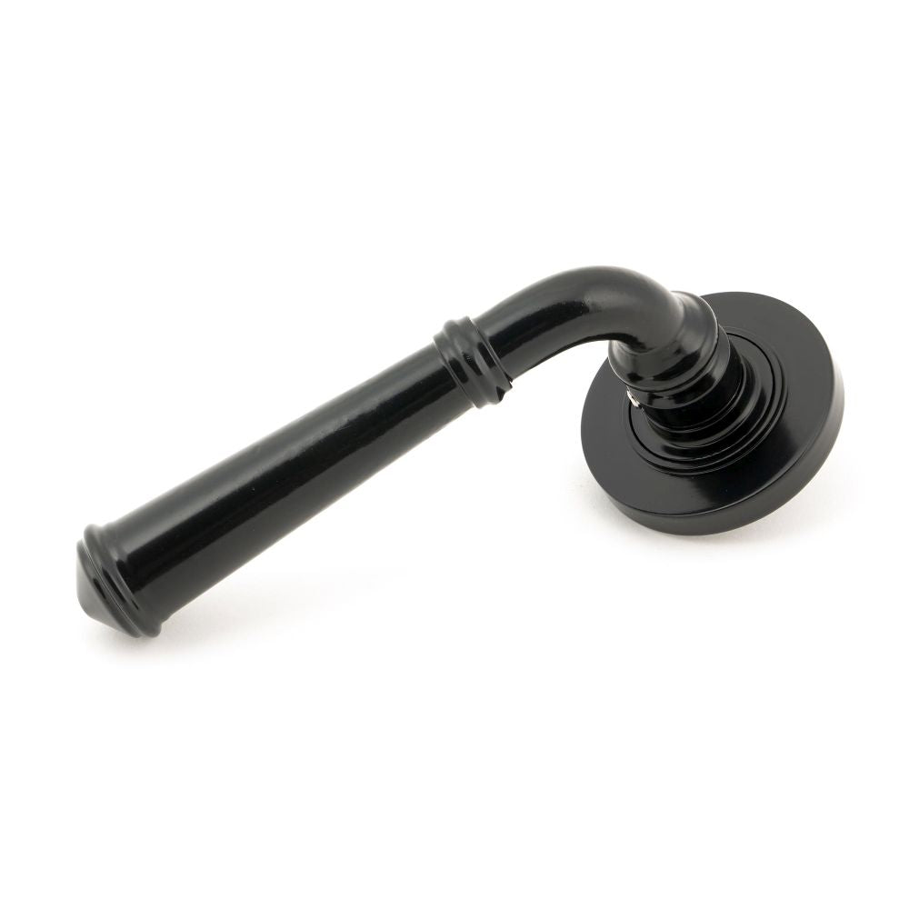 This is an image showing From The Anvil - Black Regency Lever on Rose Set (Plain) available from trade door handles, quick delivery and discounted prices