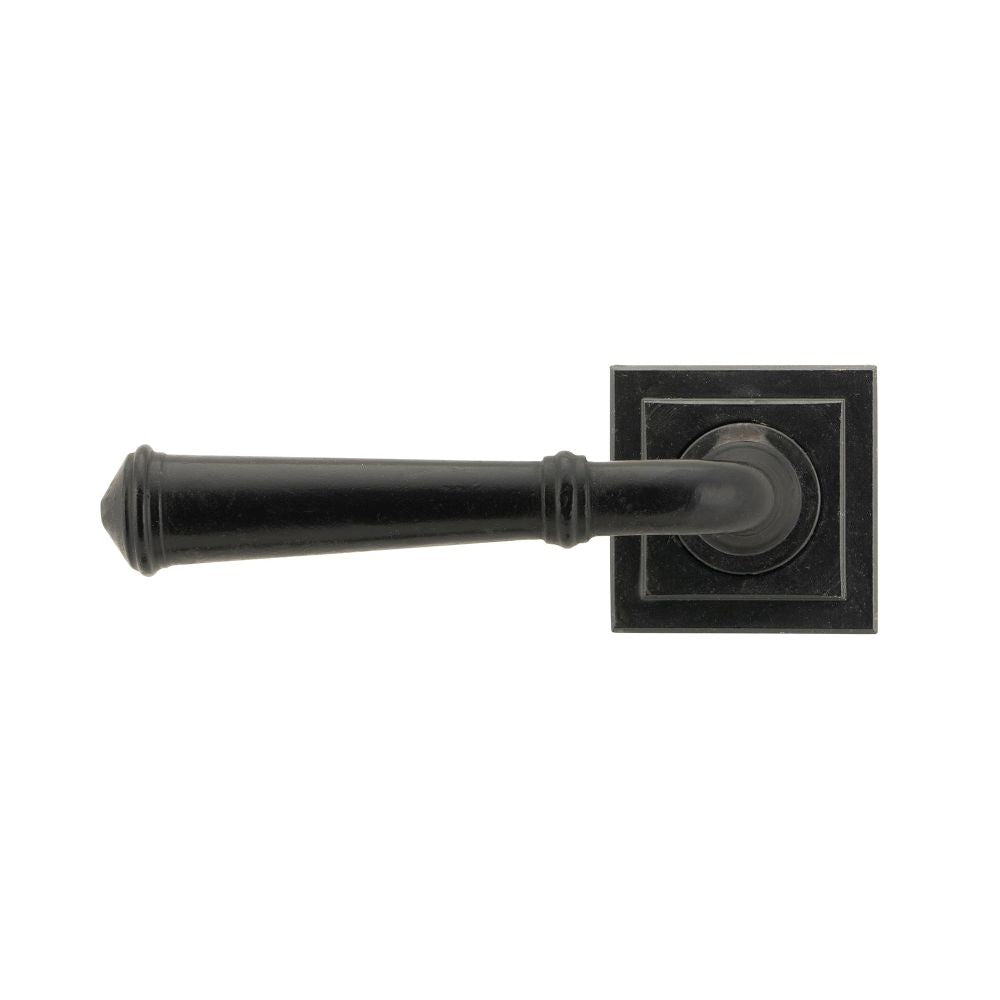 This is an image showing From The Anvil - External Beeswax Regency Lever on Rose Set (Square) available from trade door handles, quick delivery and discounted prices