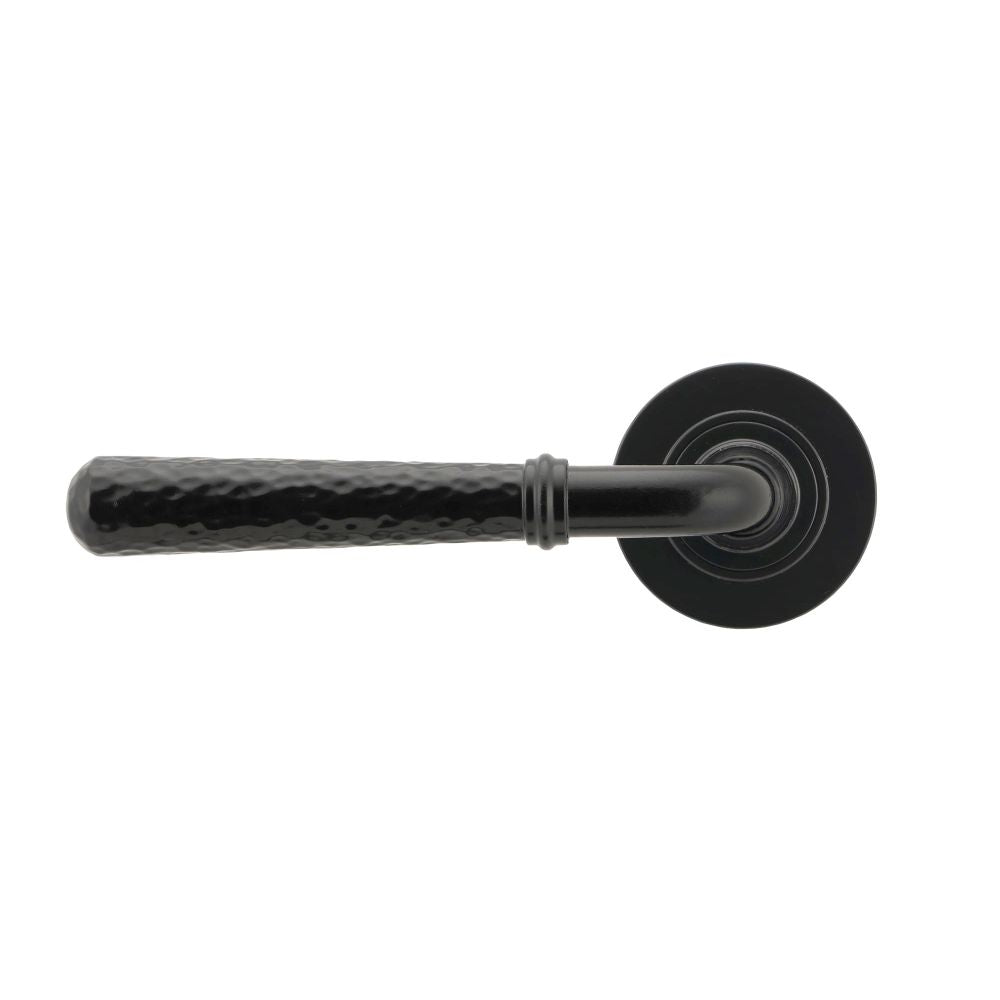 This is an image showing From The Anvil - Black Hammered Newbury Lever on Rose Set (Plain) available from trade door handles, quick delivery and discounted prices