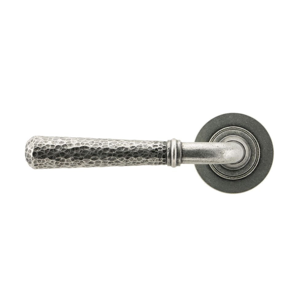 This is an image showing From The Anvil - Pewter Hammered Newbury Lever on Rose Set (Plain) available from trade door handles, quick delivery and discounted prices