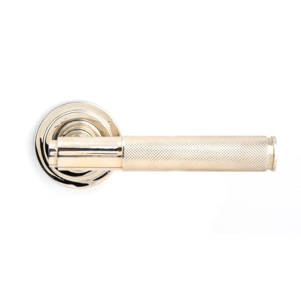 This is an image showing From The Anvil - Polished Nickel Brompton Lever on Rose Set (Art Deco) available from trade door handles, quick delivery and discounted prices