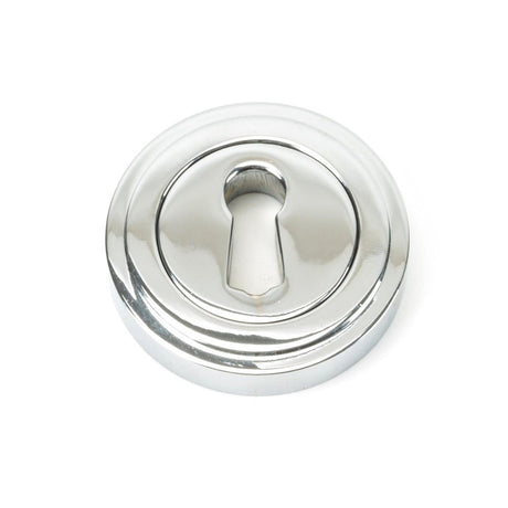 This is an image showing From The Anvil - Polished Chrome Round Escutcheon (Art Deco) available from trade door handles, quick delivery and discounted prices