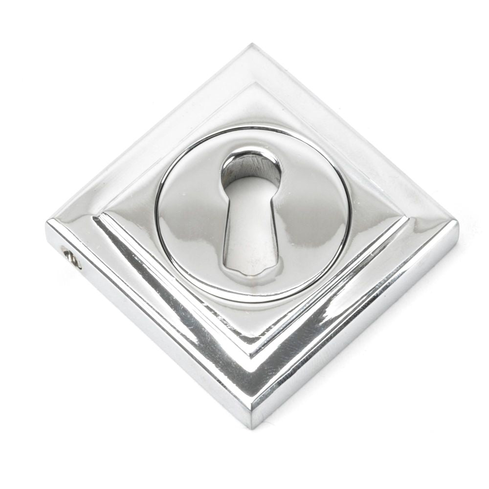 This is an image showing From The Anvil - Polished Chrome Round Escutcheon (Square) available from trade door handles, quick delivery and discounted prices