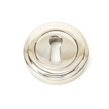 This is an image showing From The Anvil - Polished Nickel Round Escutcheon (Art Deco) available from trade door handles, quick delivery and discounted prices