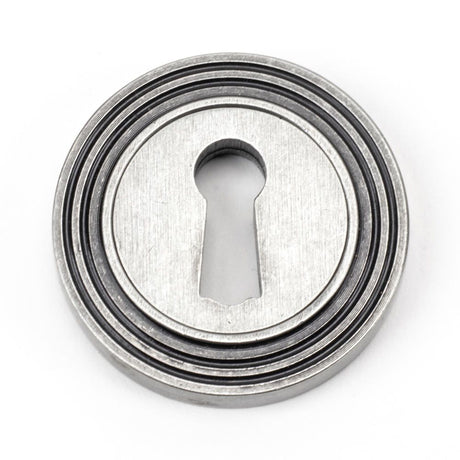 This is an image showing From The Anvil - Pewter Round Escutcheon (Beehive) available from trade door handles, quick delivery and discounted prices