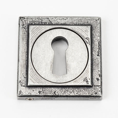 This is an image showing From The Anvil - Pewter Round Escutcheon (Square) available from trade door handles, quick delivery and discounted prices