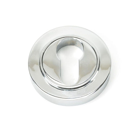 This is an image showing From The Anvil - Polished Chrome Round Euro Escutcheon (Plain) available from trade door handles, quick delivery and discounted prices