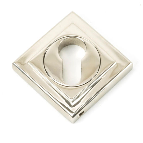 This is an image showing From The Anvil - Polished Nickel Round Euro Escutcheon (Square) available from trade door handles, quick delivery and discounted prices