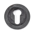 This is an image showing From The Anvil - External Beeswax Round Euro Escutcheon (Plain) available from trade door handles, quick delivery and discounted prices