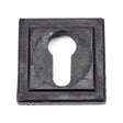 This is an image showing From The Anvil - External Beeswax Round Euro Escutcheon (Square) available from trade door handles, quick delivery and discounted prices