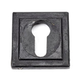 This is an image showing From The Anvil - External Beeswax Round Euro Escutcheon (Square) available from trade door handles, quick delivery and discounted prices