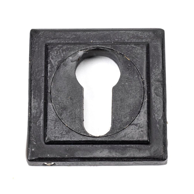 This is an image showing From The Anvil - External Beeswax Round Euro Escutcheon (Square) available from trade door handles, quick delivery and discounted prices