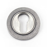 This is an image showing From The Anvil - Pewter Round Euro Escutcheon (Plain) available from trade door handles, quick delivery and discounted prices