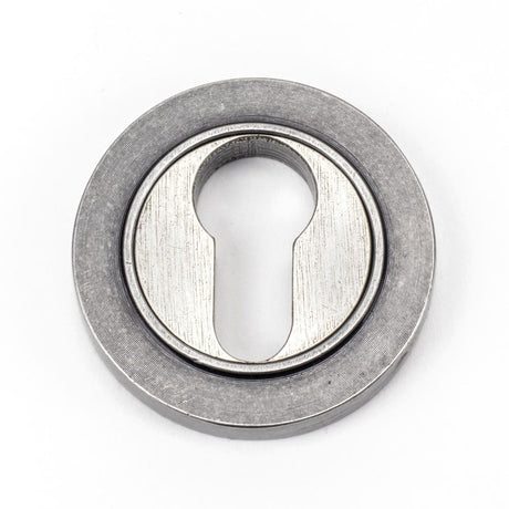 This is an image showing From The Anvil - Pewter Round Euro Escutcheon (Plain) available from trade door handles, quick delivery and discounted prices