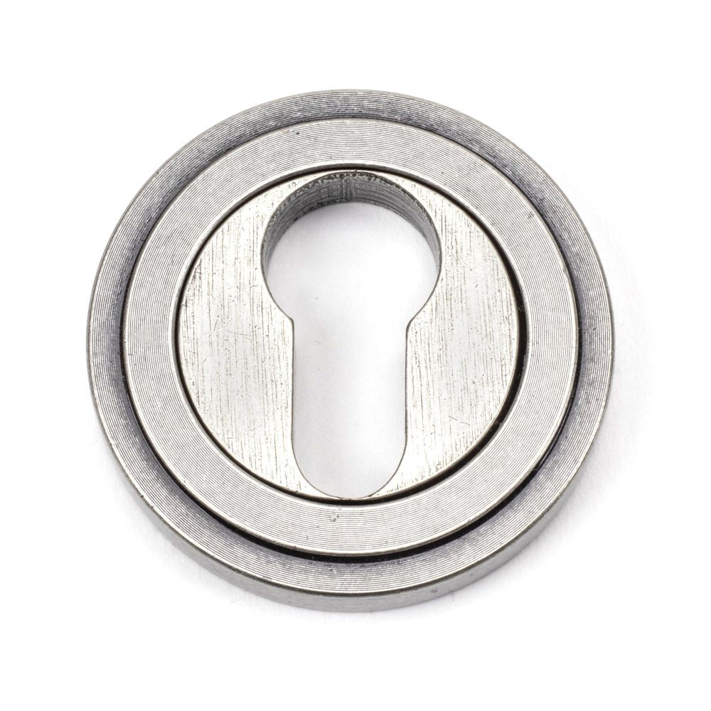 This is an image showing From The Anvil - Pewter Round Euro Escutcheon (Art Deco) available from trade door handles, quick delivery and discounted prices