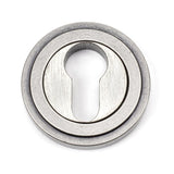 This is an image showing From The Anvil - Pewter Round Euro Escutcheon (Art Deco) available from trade door handles, quick delivery and discounted prices