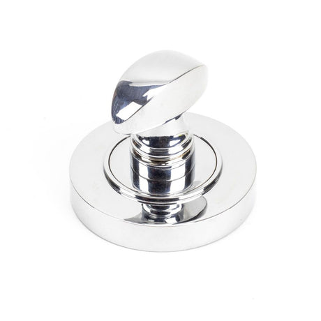 This is an image showing From The Anvil - Polished Chrome Round Thumbturn Set (Plain) available from trade door handles, quick delivery and discounted prices