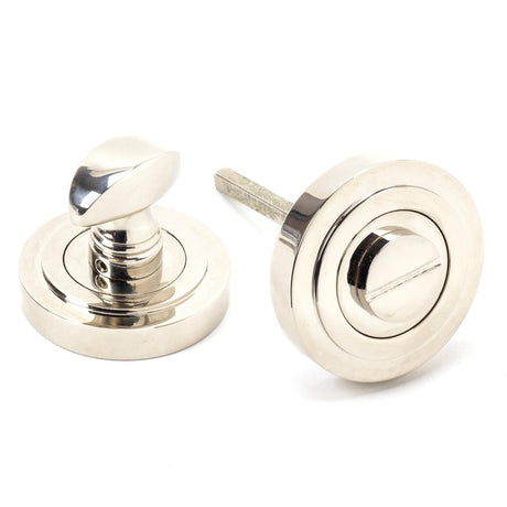 This is an image showing From The Anvil - Polished Nickel Round Thumbturn Set (Art Deco) available from trade door handles, quick delivery and discounted prices