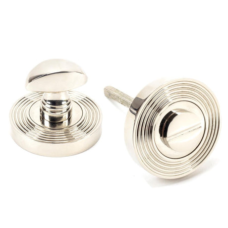 This is an image showing From The Anvil - Polished Nickel Round Thumbturn Set (Beehive) available from trade door handles, quick delivery and discounted prices