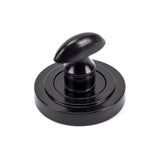 This is an image showing From The Anvil - Black Round Thumbturn Set (Art Deco) available from trade door handles, quick delivery and discounted prices