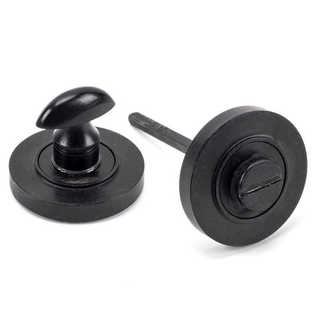 This is an image showing From The Anvil - External Beeswax Round Thumbturn Set (Plain) available from trade door handles, quick delivery and discounted prices