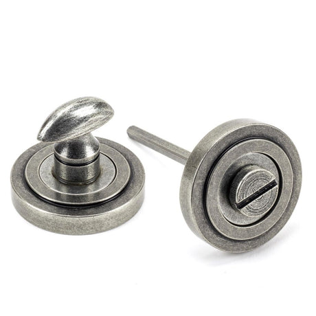 This is an image showing From The Anvil - Pewter Round Thumbturn Set (Art Deco) available from trade door handles, quick delivery and discounted prices