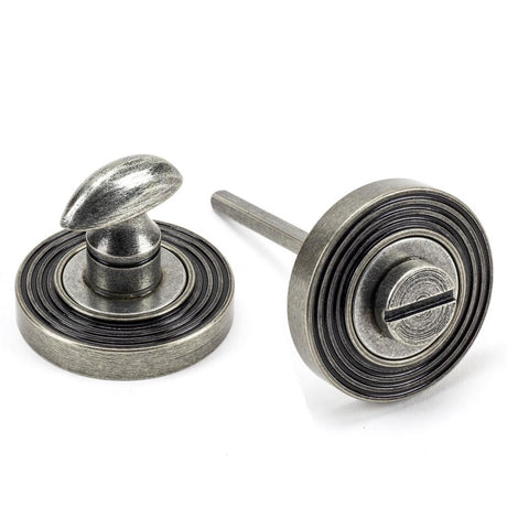 This is an image showing From The Anvil - Pewter Round Thumbturn Set (Beehive) available from trade door handles, quick delivery and discounted prices
