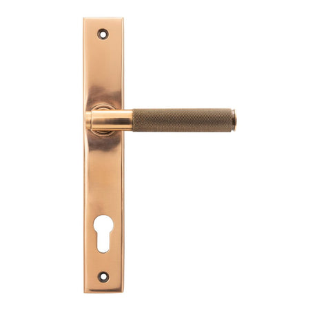 This is an image showing From The Anvil - Polished Bronze Brompton Slimline Espag. Lock Set available from trade door handles, quick delivery and discounted prices