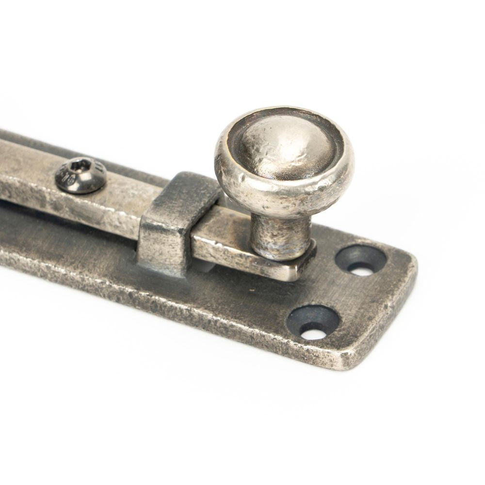 This is an image showing From The Anvil - Antique Pewter 4" Universal Bolt available from trade door handles, quick delivery and discounted prices