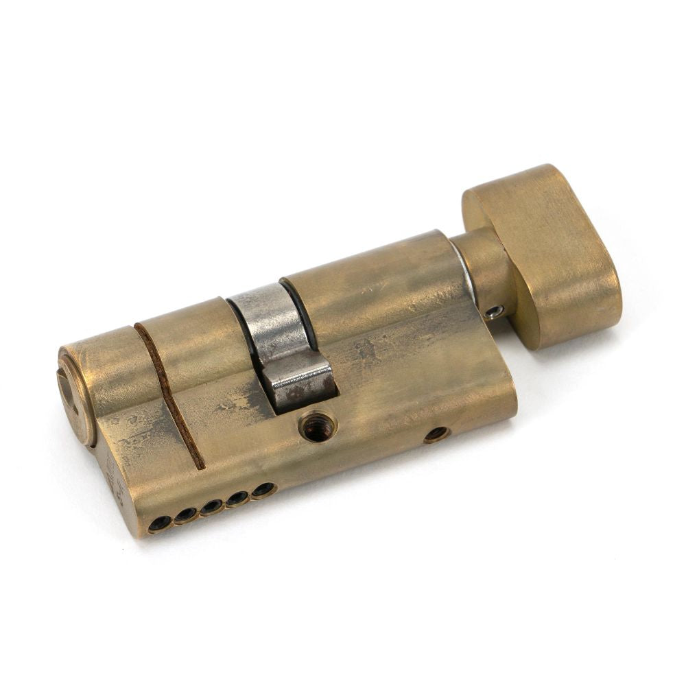 This is an image showing From The Anvil - Aged Brass 30/30 5pin Euro Cylinder/Thumbturn available from trade door handles, quick delivery and discounted prices