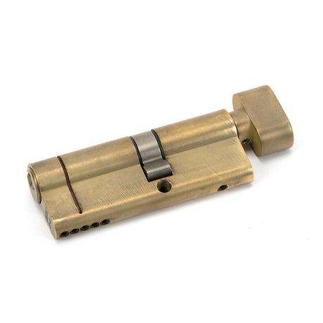 This is an image showing From The Anvil - Aged Brass 35T/45 5pin Euro Cylinder/Thumbturn available from trade door handles, quick delivery and discounted prices