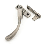 This is an image showing From The Anvil - Antique Pewter Night-Vent Locking Peardrop Fastener - LH available from trade door handles, quick delivery and discounted prices