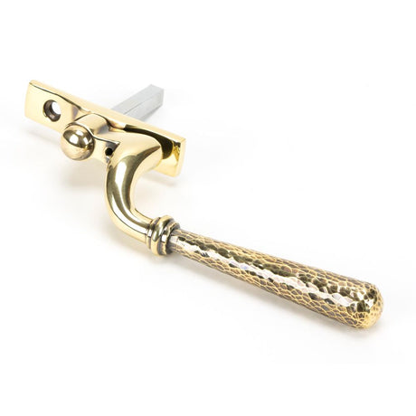 This is an image showing From The Anvil - Aged Brass Hammered Newbury Espag - LH available from trade door handles, quick delivery and discounted prices