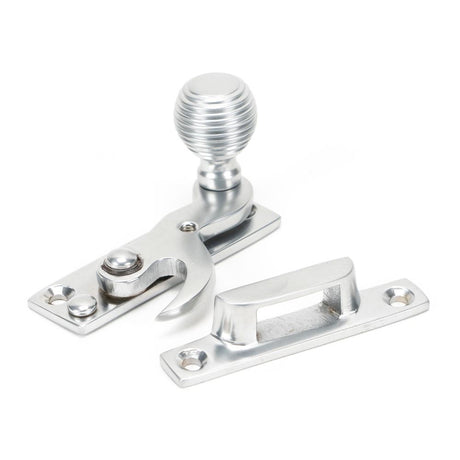 This is an image showing From The Anvil - Satin Chrome Beehive Sash Hook Fastener available from trade door handles, quick delivery and discounted prices