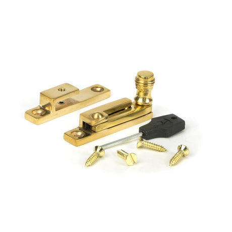 This is an image showing From The Anvil - Polished Brass Prestbury Quadrant Fastener - Narrow available from trade door handles, quick delivery and discounted prices