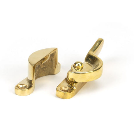 This is an image showing From The Anvil - Polished Brass Fitch Fastener available from trade door handles, quick delivery and discounted prices