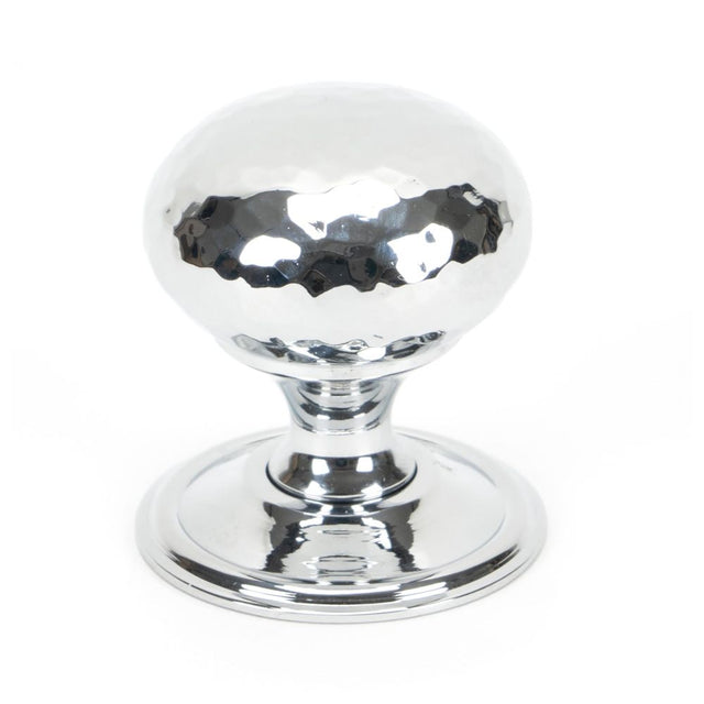 This is an image showing From The Anvil - Polished Chrome Hammered Mushroom Cabinet Knob 38mm available from trade door handles, quick delivery and discounted prices