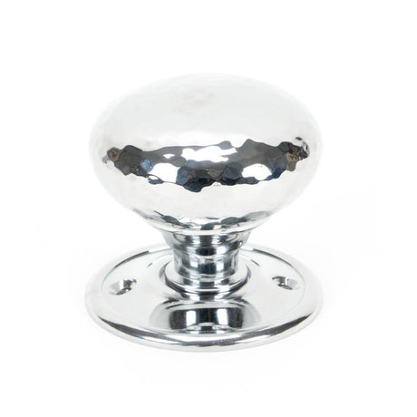 This is an image showing From The Anvil - Polished Chrome Hammered Mushroom Mortice/Rim Knob Set available from trade door handles, quick delivery and discounted prices